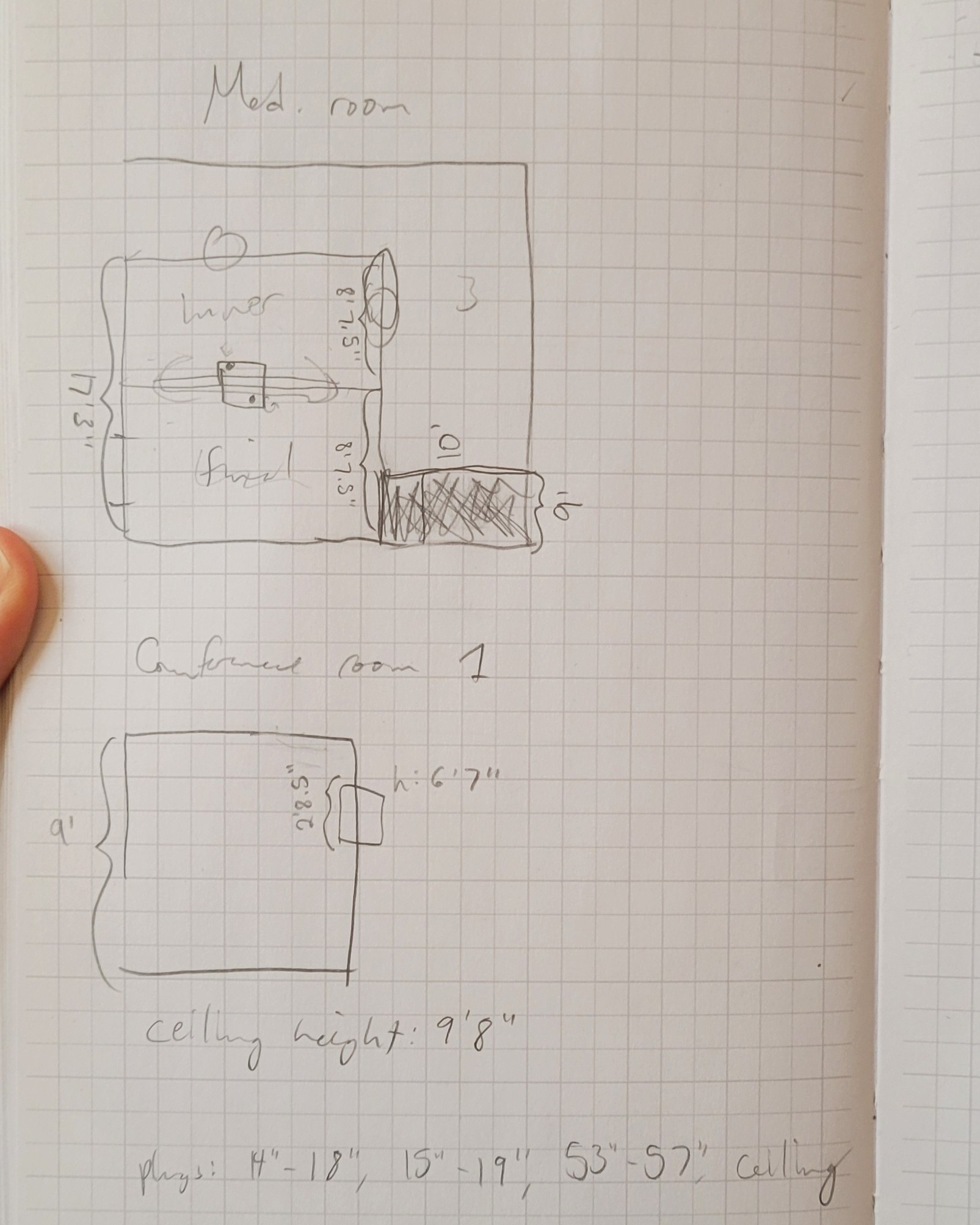 Hand-drawn diagrams of a floor plan with notes written around them.